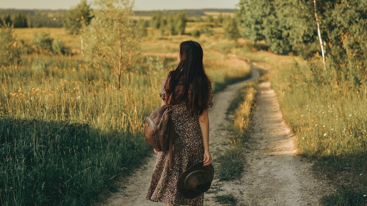 a girl walks in nature